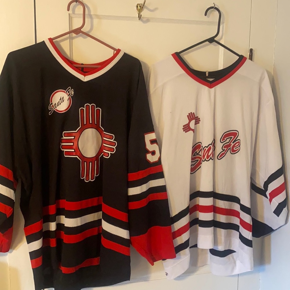 Dark and light Santa Fe Hockey Jerseys.